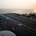 An F/A-18E Super Hornet, with Strike Fighter Squadron (VFA) 14, is taxied into position on the flight deck aboard the Nimitz-class aircraft carrier USS John C. Stennis (CVN 74).