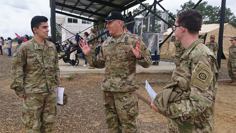 BG Cooley congratulates Soldiers receiving Italian Jump Wings at OTD XXI