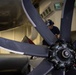 U.S. Navy Sailor conducts maintenance on an E-2C Hawkeye