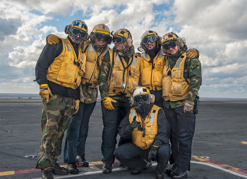 GHWB Sailors Pose for a Photo