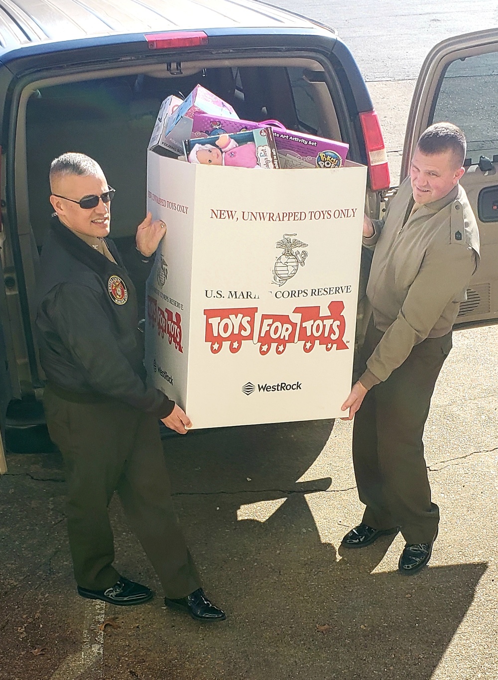 MCB Quantico's base CO, sergeant major donates to Toys for Tots NoVA campaign