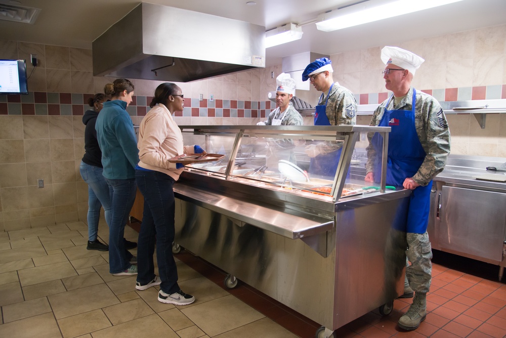 Wing leadership serves lunch before holidays