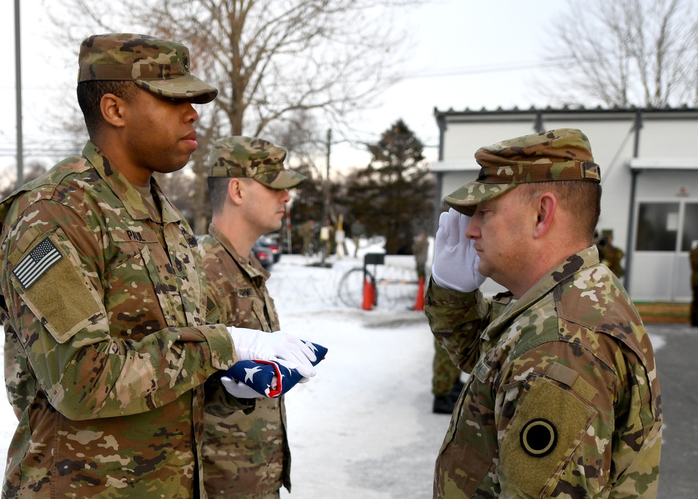 U.S. Army soldiers participate in flag raising ceremony