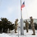 U.S. Army soldiers participate in a flag raising ceremony