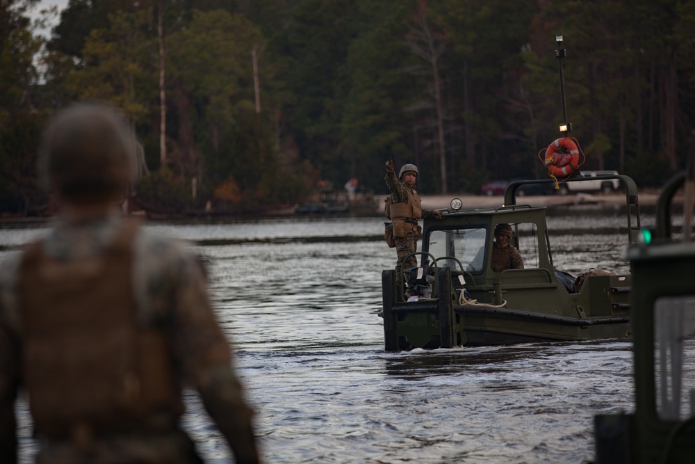 8th Engineer Support Battalion transports light armored vehicles using an improved ribbon bridge