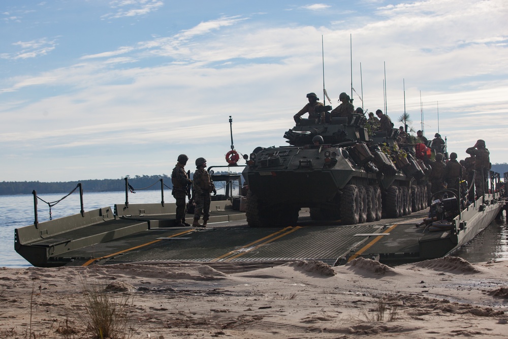 8th Engineer Support Battalion transports light armored vehicles using an improved ribbon bridge