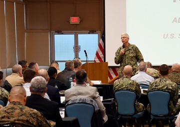 Adm. Craig Faller delivers opening remarks during Maritime Synchronization Conference