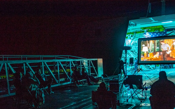 Sailors Watch Movie Underway