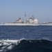 The guided-missile cruiser USS Mobile Bay (CG 53) cuts through the North Arabian Sea