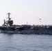 Two SA-330 Puma helicopters transport supplies between the aircraft carrier USS John C. Stennis (CVN 74)