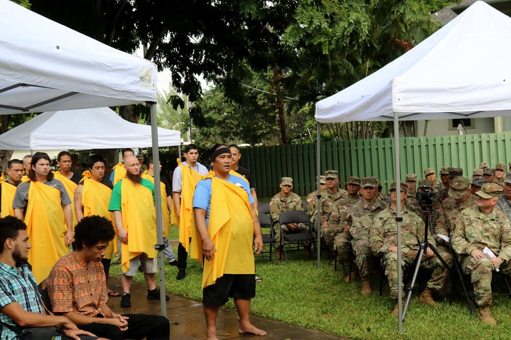 Warrior ohana performs Oli and Ha'a at promotion ceremony