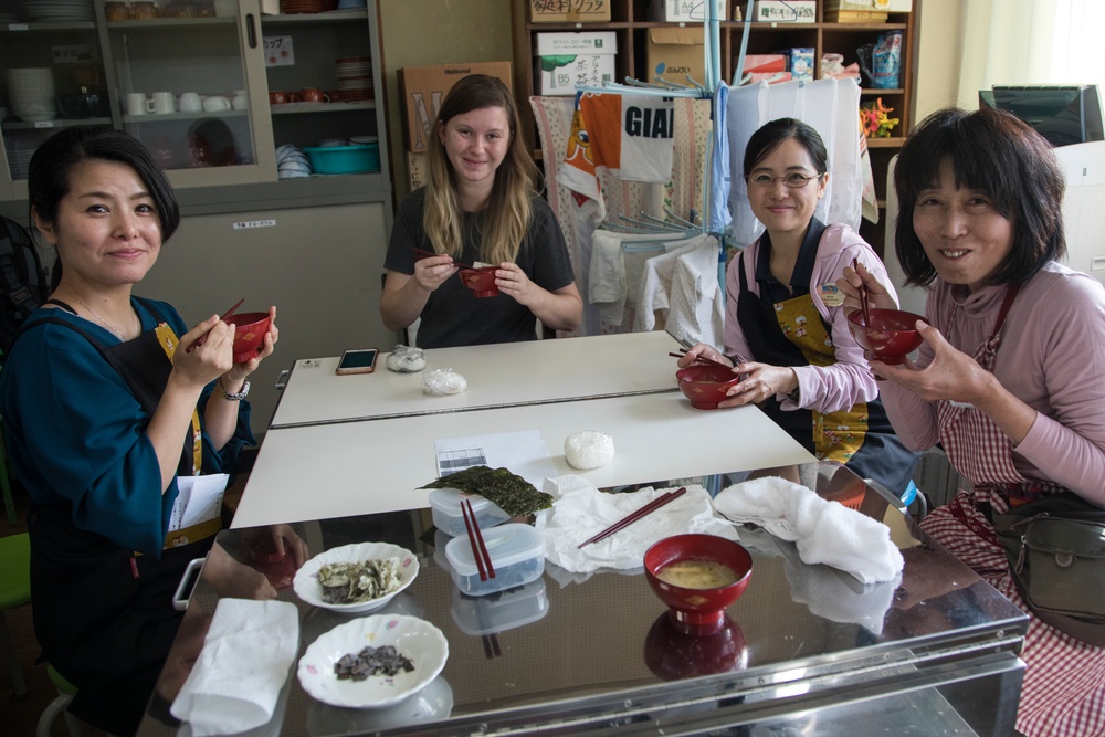 Air station residents experience flavor of local culture