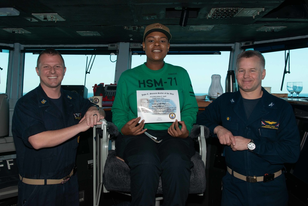 U.S. Sailor receices Sailor of the Day award