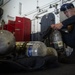 U.S. Sailor refills SCBA canister