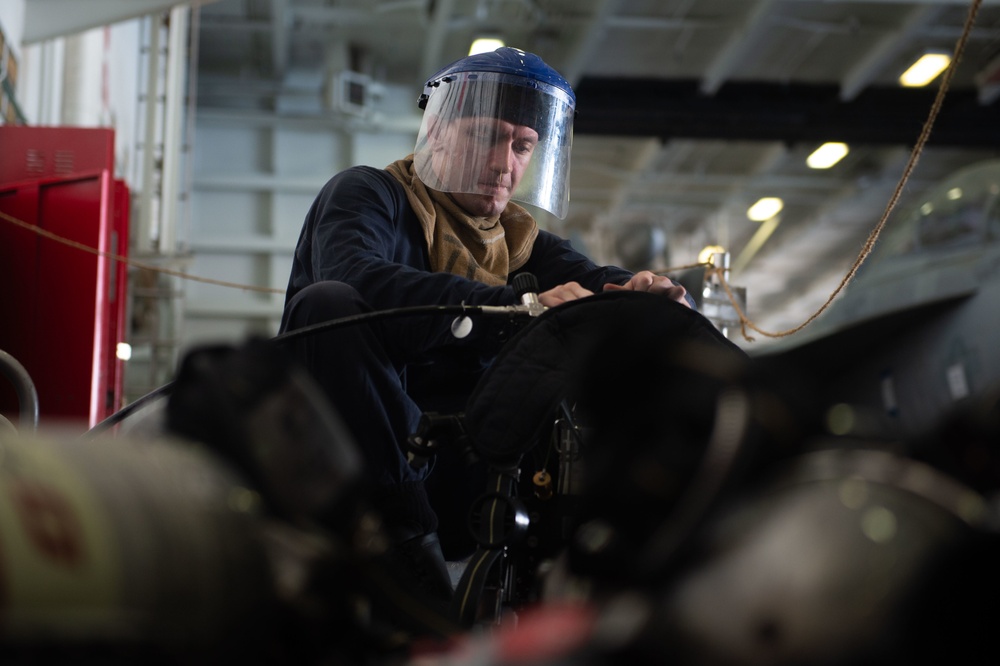 U.S. Sailor refills SCBA canister
