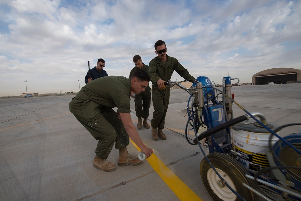 Marines offer helping hand to paint airfield