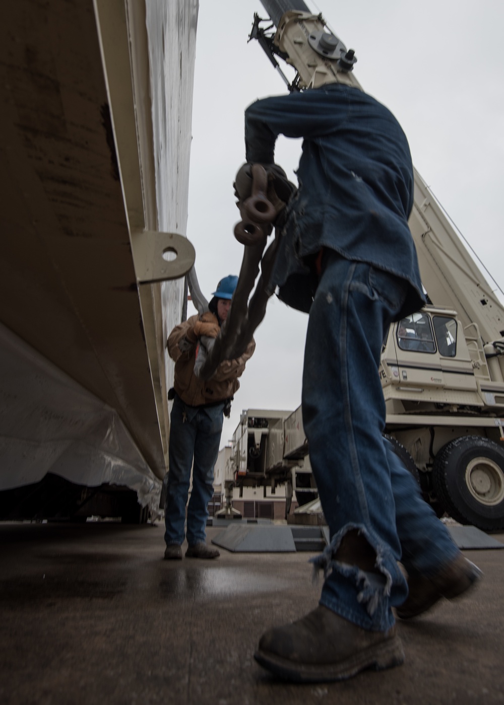 Contractors prepare the special access program facility (SAPF) to be moved onto the flightline