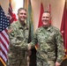 POD Commanding General presents commanders coin to 412 TEC Deputy Commanding General