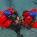 97 AMW Dives into Water Survival Training