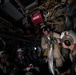 The aircraft carrier USS John C. Stennis (CVN 74) and the amphibious assault ship USS Essex (LHD 2) conduct a cross deck evolution