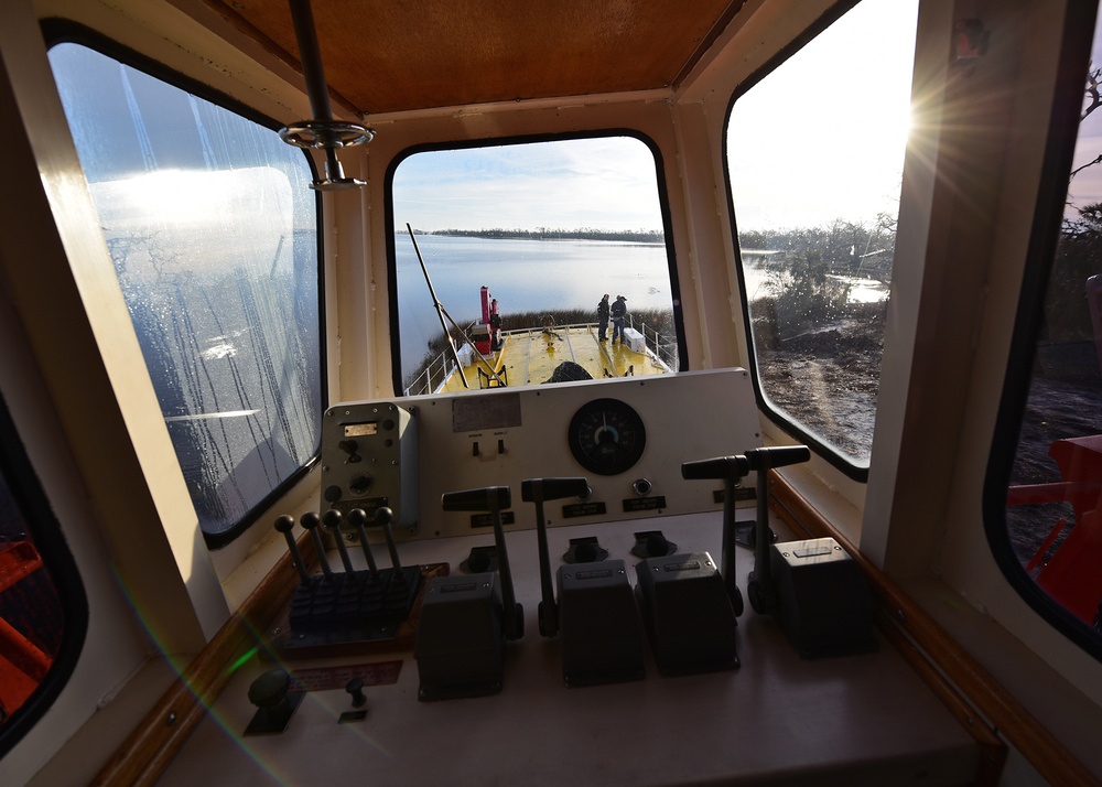 Sailors, Tyndall personnel partner to return vessel to water