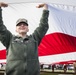 Nellis, Creech Airmen wave half-ton American flag for Las Vegas Bowl