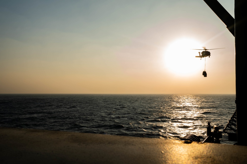 MH-60S Sea Hawk conducts replenishment-at-sea