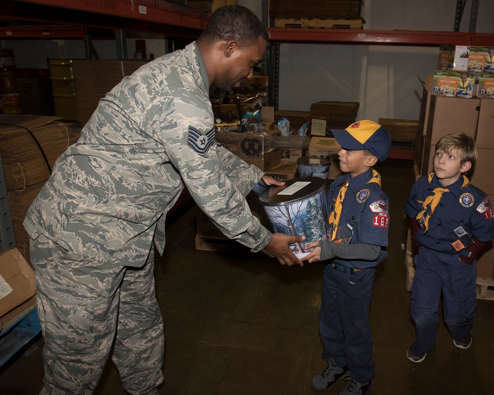Miami Valley Boy Scouts deliver popcorn donation to Wright-Patt