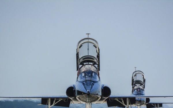 T-38 Talons taxi the runway