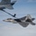 KC-135 Stratotanker refuels a U.S. Air Force F-22 Raptor