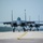 F-15E Strike Eagles taxi the runway