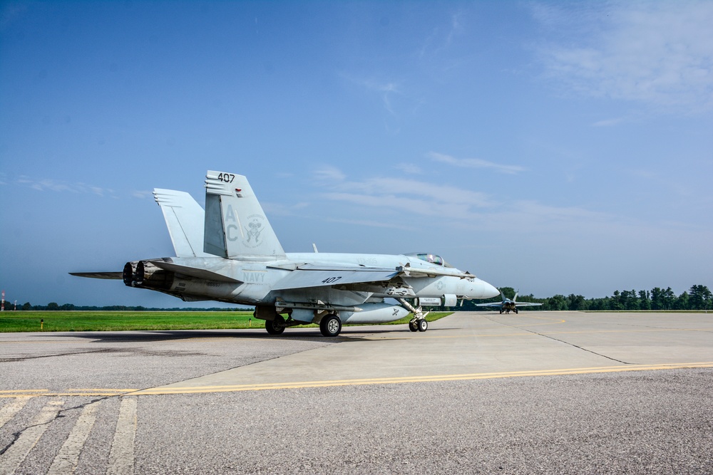 F/A-18E Super Hornets taxi the runway