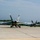 F/A-18E Super Hornets taxi the runway