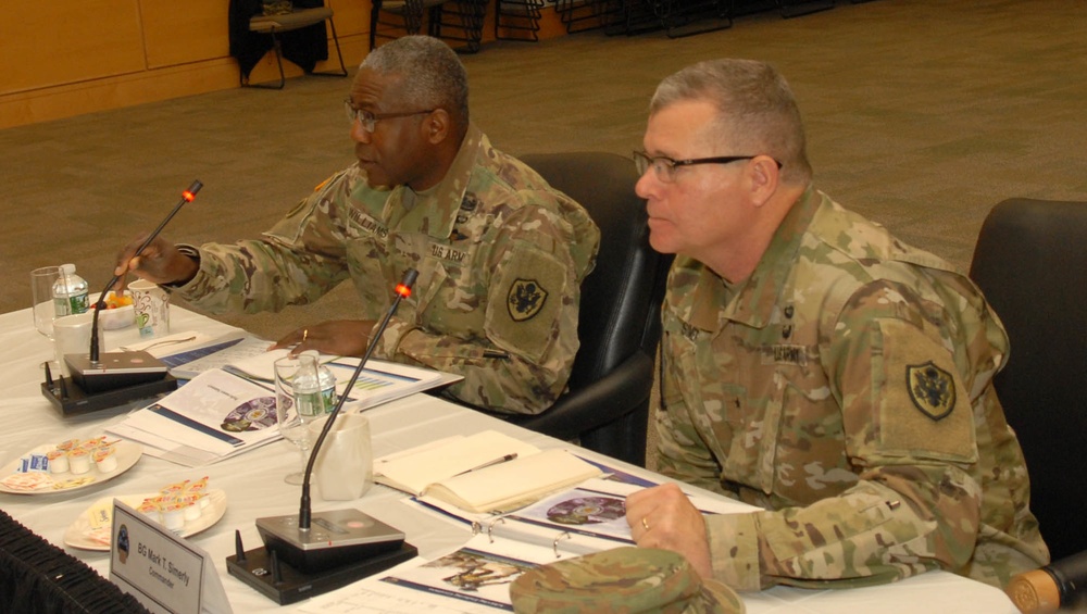 DLA Director Army Lt. Gen. Darrell K. Williams (left) and DLA Troop Support Commander Brig. Gen. Mark Simerly (right) listen senior leaders review the Troop Support operating plan at DLA Troop Support in Philadelphia Dec. 7, 2018.
