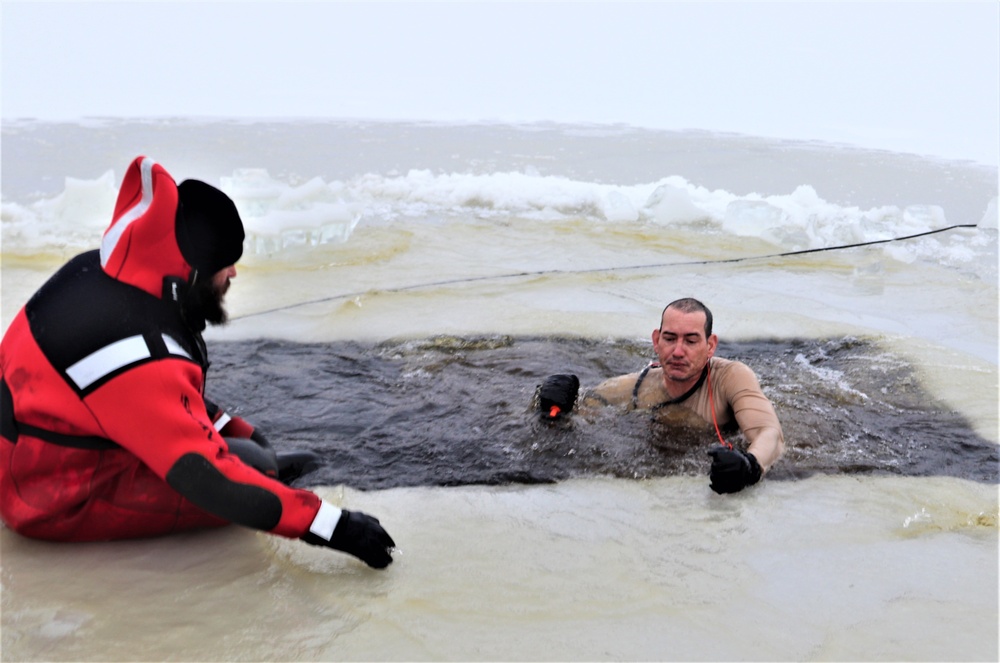 Photo Essay: Soldier takes plunge for cold-water immersion during training at Fort McCoy