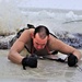Photo Essay: Soldier takes plunge for cold-water immersion during training at Fort McCoy