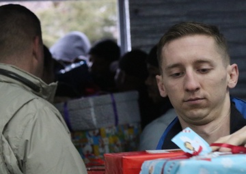 U.S. Soldiers deliver gifts to local children