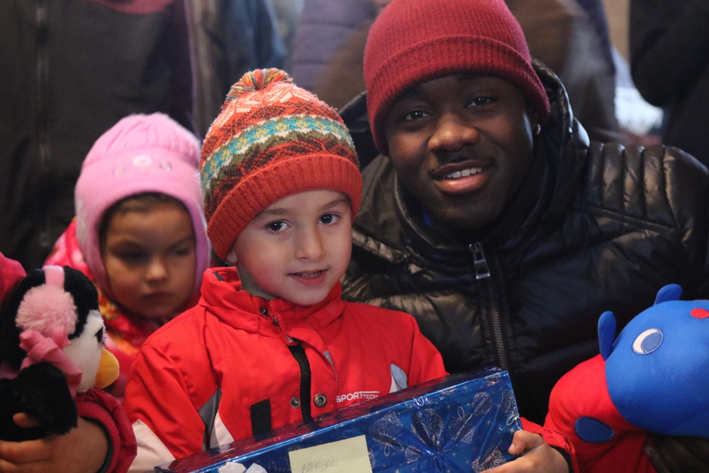 U.S. Soldiers deliver gifts to local children
