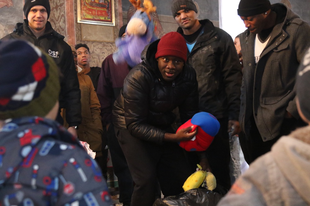 U.S. Soldiers deliver gifts to local children
