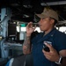 U.S. Sailor blows a boatswain’s pipe aboard USS Decatur (DDG 73)