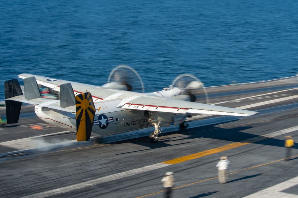 C-2A Greyhound launches from flight deck of the aircraft carrier USS John C. Stennis (CVN 74)