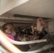 U.S. Navy Damage Controlman 3rd Class Jessica Kehling, from Hamilton, Ohio, performs maintenance in a repair locker aboard the guided-missile destroyer USS Spruance (DDG 111)