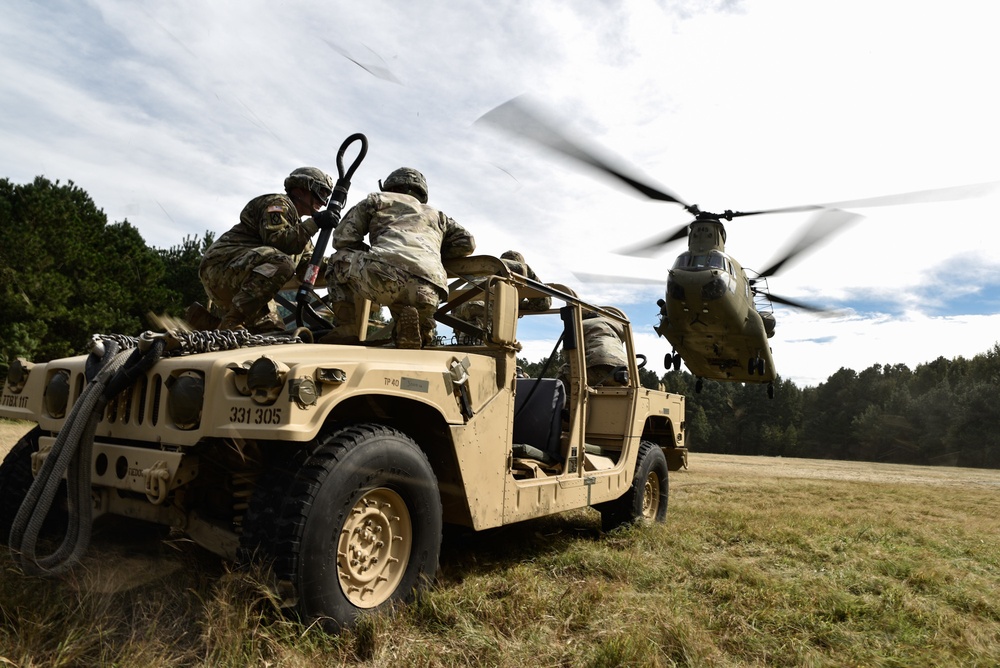 7th TB(X) Soldiers conduct sling load operations for ADAC training.