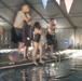 Sailors and Airmen plunge into swim qualification test