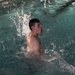 Sailors and Airmen plunge into swim qualification test