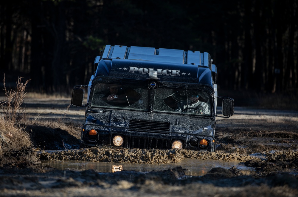 254th RTI Soldiers train local police departments in Humvee course