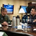 U.S. Navy Rear Adm. and French Capt. meet aboard the aircraft carrier USS John C. Stennis (CVN 74)
