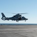 An AS565 Panther prepares to land on the flight deck aboard the aircraft carrier USS John C. Stennis (CVN 74)