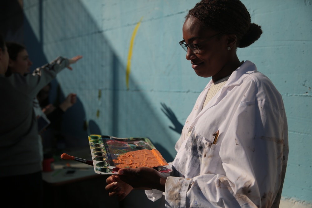 SPMAGTF Marines and Sailors Paint School Mural