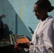 SPMAGTF Marines and Sailors Paint School Mural